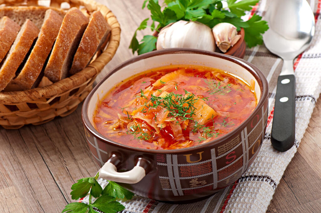 Ukrainian and russian national red soup borsch closeup Журналист