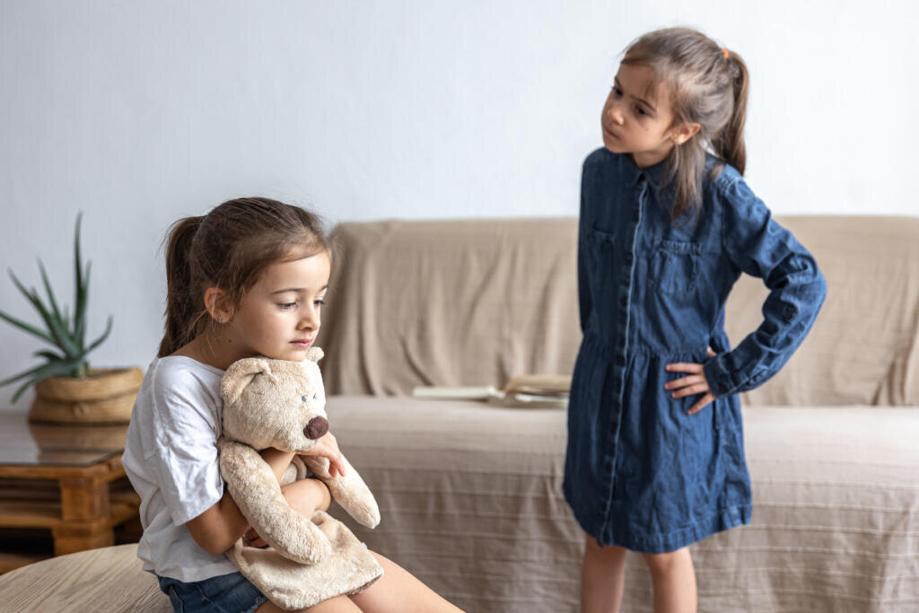 Small children quarrel over toys. Friends and friendship problem. Quarrel and conflict. Журналист