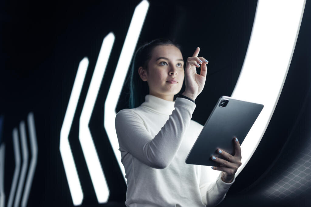 Asian girl pressing on digital screen futuristic technology Журналист