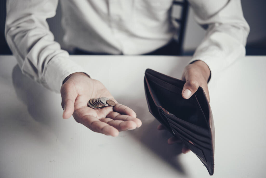 businessman saving money, Close up man carrying a wallet in hand, the dollar,finance accounting concept Журналист
